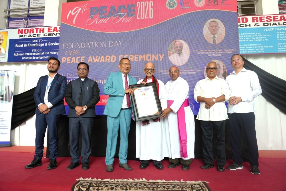 Archbishop Emeritus Most Rev. Thomas Menamparampil receiving the Peace Award 2026 from dignitaries during the 19th Peace Knit Fest at Peace Centre, Chümoukedima, on October 30.